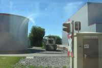 June 2017 grab shot (from a bus) of a diesel shunter at an industrial plant in Krauechenwies on the freight-only line from Mengen on the Sigmaringen-Aulendorf cross-country route in southern Baden-Wuerttemberg. Throughout Germany one of the most striking contrasts with Britain is the widespread extent of modern industry (large, medium and small) – and private rail sidings continue to serve industrial plants much smaller than have justified retention in Britain.<o:p></o:p></span></p><p class=MsoNormal><span style='font-size:12.0pt'><o:p> </o:p></span></p><p class=MsoNormal><span style='font-size:12.0pt'><br>
<br>
<br><br>[David Spaven 11/06/2017]