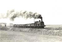 An ex-Caledonian 0-6-0 entering the Whitehill Colliery branch at Dykes Junction on 30 March 1959 [see image 60035]. The colliery closed in 1965.<br><br>[G H Robin collection by courtesy of the Mitchell Library, Glasgow 30/03/1959]