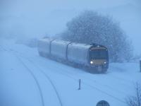 Greenhill Lower sees 170454 struggling through the heaviest snowfall in Central Scotland for many years on 6th December 2010. The temp was as I recall about -20.<br>
<br><br>[Douglas McPherson 06/12/2010]