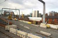 The first track has now appeared on the new Ordsall Chord, seen here on 27 July 2017 from a train travelling between Castlefield and Ordsall Junctions. The new track is connected up to this line but at the moment only goes as far as the RRV before the bridge.<br><br>[John McIntyre 27/07/2017]