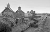 Newseat station on the Peterhead line, closed in 1965 and derelict by 1977 when this photo was taken. It has since been completely rebuilt and is now a fine house.<br>
<br><br>[Bill Roberton //1977]
