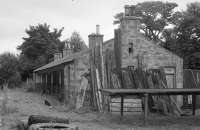 The remains of Mintlaw station, on the Peterhead line, photographed in 1977. Mintlaw and the other branch stations had closed twelve years earlier in 1965. [See image 48719]<br><br>[Bill Roberton //1977]