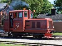 The diesel shunter hurries off to retrieve the service train from the far end of the line. A grass fire had broken out and to avoid any further occurrences the railway decided to withdraw the steam loco from service.<br>
This is a type Z4p from 1956 ordered by SJ which had by then taken over Gotland's passenger railways. A few of this type were shipped out to the island possibly on the deck of a fishing boat and shipped back about 4 years later for use elsewhere on the 891mm network after all the island's lines had closed.<br><br>[Charlie Niven 05/07/2017]