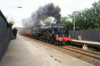 Royal Scot 4-6-0 46115 <I>'Scots Guardsman'</I> charges through Lostock Hall station on 1 August 2017 with the northbound leg of <I>'The Fellsman'</I> railtour.<br><br>[John McIntyre 01/08/2017]