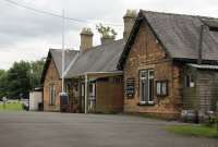 Middleton-in-Teesdale station, nicely maintained and in use as the caravan site office. Closed to passengers with the line in 1964. Seen from the station approach road in June 2017.<br><br>[Mark Bartlett 26/06/2017]