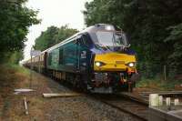 DRS 68025 moves off from the EKT exchange with the signaller at Midge Hall on 21 July 2017. This was not the normal stock for the Ormskirk to Preston services as it was a Northern Belle charter from London Victoria in connection with the Open Golf at Birkdale. This was the return journey from Ormskirk heading to Preston where the train reversed before heading south to London.<br><br>[John McIntyre 21/07/2017]