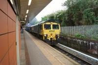 A Freightliner Class 66 passes Salford Crescent with the empty binliner train heading to the loading point at Pendleton, Brindle Heath just over a mile away. [Ref query 1664]<br><br>[John McIntyre 27/07/2017]