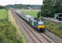 68004 <I>Rapid</I> heads an excursion from Bristol to Carlisle seen at Woodacre on 22nd July 2017. When the two ex-Anglia coaches are also repainted blue and grey this will make a splendid <I>Inter-City</I> set.<br><br>[Mark Bartlett 22/07/2017]