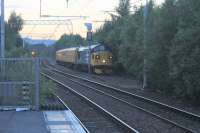 After touring West Scotland with the Network Rail train on the evening of 12th July 2017, 37025 <I>Inverness TMD</I> is seen running through the goods loop at Coatbridge Central as it takes the train to Carlisle. <br>
<br><br>[Alastair McLellan 12/07/2017]