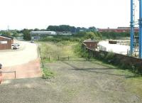 The gradually changing scene at Rome Street Junction. View south from Rome Street Bridge in June 2004, with fence posts having appeared on the trackbed. [See image 59279]<br><br>[John Furnevel 04/06/2004]