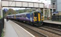 153316 and 142023 call at Shipley station on 21st October 2016 with a Leeds to Morecambe (via Wennington) service. The train is in the 1979 built platform, viewed from the even later 1992 platform. Prior to 1979 a through train like this would have had to reverse in the Bradford branch platforms. [See image 37486] for the same location in 1974.<br><br>[Mark Bartlett 21/10/2016]