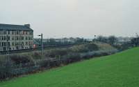 View west, just west of Clydebank station. On the left is the North British extension from Yoker to Dalmuir. Just to the left of that is the British Railways spur of 1976 from Clydebank Central Junction to the Lanarkshire and Dunbartonshire Railway allowing closure of Clydebank to Scotstoun West Junction.<br>
<br>
The photograph was taken in 1996 from the former L&D alignment - at the west end of the former Kilbowie station. The bridge over the NB was removed after closure.<br><br>[Ewan Crawford //1996]