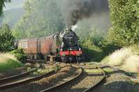 Approaching the foot crossing west of the Whalley Viaduct, 46115 'Scots Guardsman' is working hard on the 1 in 82 climb for much of the way to the summit at Ramsgreave on 01 August 2017. <br><br>[John McIntyre 01/08/2017]