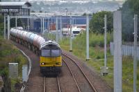 Colas 60095 nears its destination with the Dalston - Ineos empty tanks.  Note the electrification masts. 1 August.<br><br>[Bill Roberton 01/08/2017]