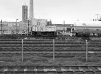 View from a passing train of the sidings at ICI Ardeer in 1985. [Ref query 1669]<br><br>[Bill Roberton //1985]