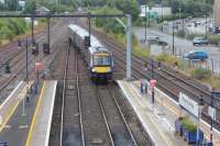 0948 from Glasgow Queen St to Stirling arriving at its destination.<br><br>[Alastair McLellan 29/07/2017]