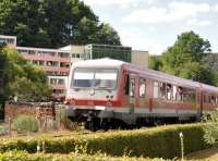 A DB Class 628 DMU approaching Dahn Süd.  These sets, built between 1986 and 1996, consist of a power car and a trailer car, the unpowered trailer being designated class 928.  This service had started from Bundenthal-Rumbach, the terminus of the Wieslauterbahn, and was en-route to Neustadt (Weinstrasse).  After further stops at Dahn and Hinterweidenthal Ort, the train will join the east-west line from Zweibrucken to Landau then continue north to its final destination.  The building in the background, the Pfalblick Hotel, provides an ideal base for walking and cycling in this area, and the benefit of watching the trains on the Wieslauterbahn!  [With thanks to Bill Jamieson for loco information.]<br><br>[Norman Glen 25/06/2014]