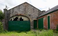 The north end of the original Newtyle station showing the platform and building added to the right after conversion for goods. The building's gable end was also modified and offices on the east side demolished. View looks south.<br><br>[Colin Martin 24/06/2017]