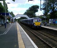 A through service crawls into Scotstounhill, a signal (nearly) stops fooling people into thinking that this is Dumbarton Central service indicated.<br><br>[David Panton 05/08/2017]