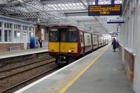 314213, in SPT livery and now some 38 years old, calls <I>right time</I> at Paisley Gilmour Street on a service for Gourock on 7th August 2017. These noisy old units contrast with the new Class 380s that they have replaced on some Gourock and Wemyss Bay services and there have been <I>letters to the (local) press!</I>.<br>
<br><br>[Colin Miller 07/08/2017]