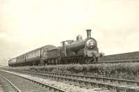 Driver William Clark and Fireman J. McNey of Corkerhill with Caley Jumbo 57266, photographed during a stop for reversal at Greenlaw Goods on the first day of September 1951. The train is the <I>Paisley and Barrhead District Tour</I>, organised by the Stephenson Locomotive Society.   <br><br>[G H Robin collection by courtesy of the Mitchell Library, Glasgow 01/09/1951]