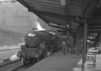 Kingmoor Black 5 no 45279 seen here after taking over train 1S67, the Saturday down relief <I>Thames-Clyde Express</I>, at Carlisle platform 3 on 5 August 1967. The train had been worked in from Leeds by Jubilee 45593 <I>Kolhapur</I>. [See image 38593] <br><br>[K A Gray 05/08/1967]