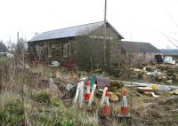 The former goods shed and yard at Alne, seen looking north east from the roadside on 25 March 2010. Alne station closed to passengers in 1958 and was subsequently demolished. The surviving goods facilities are currently used by a stonemason. [See image 28568] [Ref query 1673]  <br><br>[John Furnevel 25/03/2010]