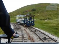 Passing loop on the upper section of the Great Orme funicular seen from the front of the tramcar in July 2017. As each car leaves the loop (up and down) it sets the trailing points so that on return it takes the same route to prevent cable entanglements. The tramcar <I>drivers</I> are in radio contact with the winch operator and advise if it is necessary to stop or slow the cars due to obstructions etc.  <br><br>[Mark Bartlett 26/07/2017]