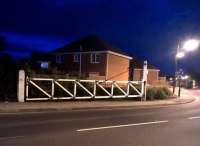 On the East side of the main road through the village of Wingate, Co Durham, the gate posts from railway days are now joined by a nice new gate. There used to be fake rail grooves across the road, but they have been tarmacked over. [see also image 60442]<br><br>[Ken Strachan 03/08/2017]