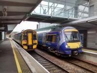 170455, on a Dundee service crosses 158706 on a Fife to Edinburgh train at Edinburgh<br>
Gateway on 12 August 2017<br>
<br><br>[David Panton 12/08/2017]