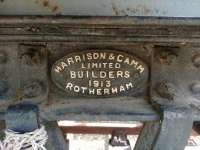 Makers plate from a Harrisons and Camm of Rotherham railway wagon dating from 1913. The old van is on a short section of track awaiting restoration at Maud station.<br><br>[Alan Cormack 06/08/2017]