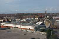 A view north-eastwards from behind the station building at Blackpool North. Electrification preparation work is well underway with the closure and demolition of platforms 1, 2 (right of station), 7 and 8 (left of the building). Along the line from Preston several OHL stanchions have been erected and at Kirkham work continues with the other station rebuilding.<br><br>[John McIntyre 23/08/2017]