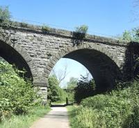 The southernmost span of Smardale Viaduct on the S&C, which crosses over what was once the Kirkby Stephen (East) to Tebay section of the Stainmore line, about a quarter mile west of the former Smardale station. Presumably the vegetation growing out of the masonry joints demonstrates Network Rail's commitment to biodiversity. 25th May 2017. [Ref query 1157]<br>
<br><br>[Bill Jamieson 25/05/2017]