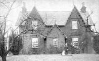 Photograph showing the station house at Beattock, thought to have been taken in 1864, featuring station master Thomas Cowan and members of his family. [Photograph kindly contributed by Professor Dorothy Whittington (great, great, granddaughter of Thomas Cowan) following publication of a recent photograph of the old station house on Railscot.] [See image 58931].<br><br>[Dorothy Whittington Collection //1864]
