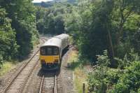 A Northern service from Blackburn to Manchester Victoria via Burnley takes the single line to the right at Stansfield Hall Jct heading to the next stop at Todmorden. The line to the left leads to Hall Royd Jct and Hebden Bridge.<br><br>[John McIntyre 17/08/2017]
