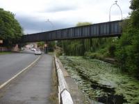 Looking north to the lengthy steel bridge on the former York Foss Island branch that still crosses both Huntington Road and the River Foss under its new use as part of a foot and cycle track that runs from Wiggington Road, passing the nearby Rowntree branch junction, through to York Layerthorpe, and then continuing along the former Derwent Valley Light Railway trackbed to Osbaldwick on the eastern outskirts of York.<br><br>[David Pesterfield 01/08/2017]