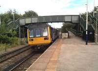 The 18.09 to Sheffield leans into the curve as it stops at Conisbrough, four stops from its destination. The Pacers may be old and basic, but they are still providing a useful service.<br><br>[Ken Strachan 16/08/2017]