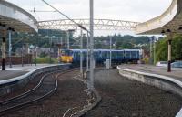 314203 leaves Wemyss Bay, and its reverse curves, with a Glasgow train on 17th August 2017.<br><br>[Ewan Crawford 17/08/2017]