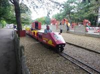 Another circuit around the play area for the only train on the Happy Mount Park miniature railway in Morecambe. The locomotive appeared to me to be a freelance design but my granddaughter assured me it was a Pendolino. 25th August 2017.  <br><br>[Mark Bartlett 25/08/2017]