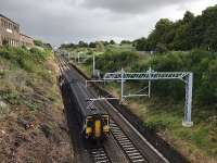 With a few days to go before the wires were energised, 156500 on an Anniesland service climbs noisily out of the tunnel and under the substantial metalwork which is now a feature of the line. The OHLE remains under test until October 2017, with no electric traction permitted before then. <br><br>[Colin McDonald 30/08/2017]