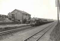 An Oban - Glasgow train passing Balornock shed approaching the end of its journey on 26 July 1955. The locomotive is Perth based Black 5 no 45049. <br><br>[G H Robin collection by courtesy of the Mitchell Library, Glasgow 26/07/1955]