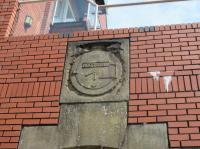 This is a picture of a stone which is built into the wall of the flats that surrond Swansea Dock Marina. The flats are built close to the original site of Swansea Victoria station.<br><br>[Alastair McLellan 13/08/2017]