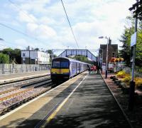 A Lanark to Glasgow Central service calls at a well-kept Uddingston on 2nd<br>
September 2017. Having been brought up in Duddingston I've always felt that<br>
Uddingston has something lacking.<br>
<br><br>[David Panton 02/09/2017]