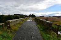 The view south towards Dyce on the River Ythan viaduct at Ellon. The line is now The Formartine and Buchan Way.<br><br>[John Gray 23/08/2017]