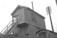 Andoversford Signal box in September 1962. This was the junction of the Kingham to Cheltenham branch and the MS&WJ to Swindon and beyond. I think the MS&WJ came later.<br><br>[John Thorn /09/1962]