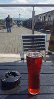 An unusual view from a table at the Russell Tea Room and ... a cooling pint of fruit cider.<br><br>[John Yellowlees 20/06/2017]