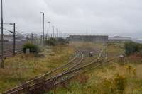 Falkland Yard, West Sidings, with nothing happening and looking slightly overgrown and rusty. There's far less coal traffic with only Killoch in use. In the background is the former Scottish Agricultural Industries works.<br><br>[Ewan Crawford 07/09/2017]