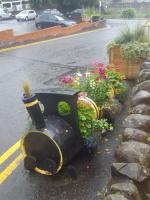 The only train in Callander today; the barrel train beside the toilets at the rear of the Dreadnought Hotel. The car park on the site of the station is off to the left with a small amount of metal fencing on the ramp up to Ancaster Road.<br><br>[John Yellowlees 28/08/2017]