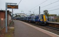 A northbound 380 draws to a pause at Newton-on-Ayr, its first stop on the way to Glasgow.<br><br>[Ewan Crawford 07/09/2017]