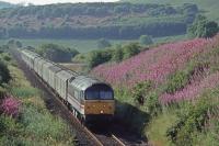 47817 approaches Abdie with a diverted overnight London - Inverness service.  Originally constructed with double track throughout most of the Ladybank - Hilton Jctn route was singled in 1933.  The exceptions being Newburgh - Glenburnie Jctn and Bridge of Earn - Hilton Jctn which were singled in 1960 and 1972 respectively.  29th July 1990.<br><br>[Graeme Blair 29/07/1990]